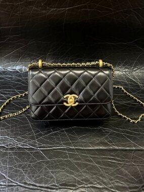Authentic Chanel Black Quilted Lambskin Flap Bag with Gold Turnlock & Chain Stra